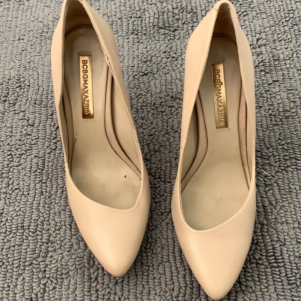 Nude BCBG asymmetric pumps